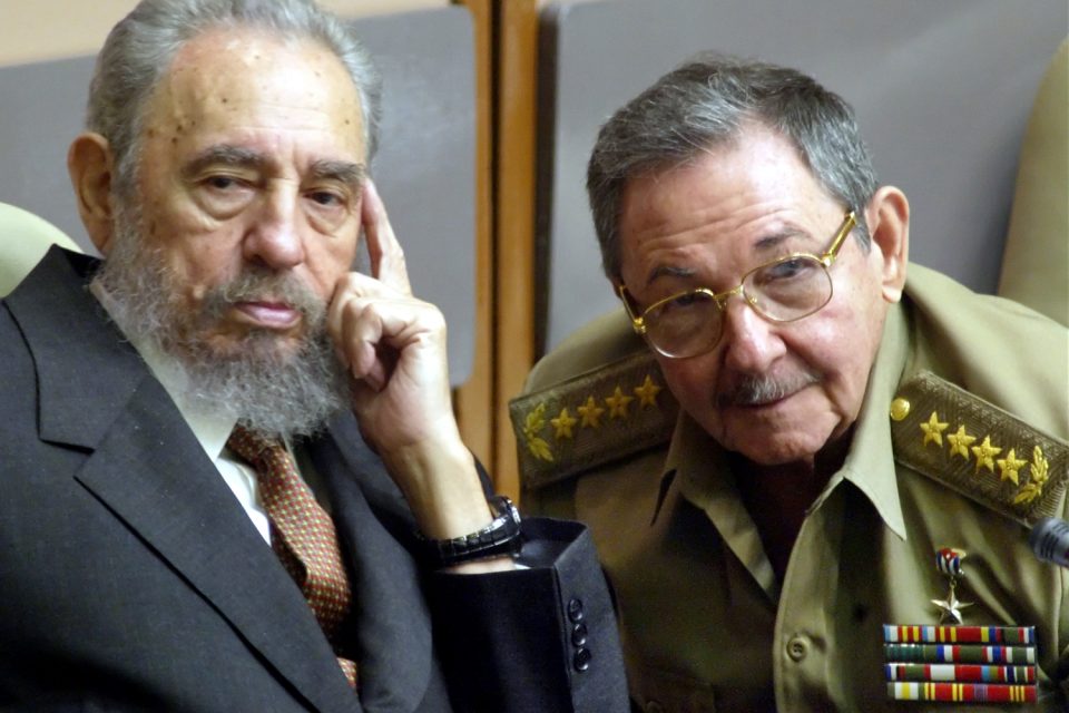 FILE - In this July 31, 2004 file photo, Cuba's President Fidel Castro, left, and his brother, Minister of Defense Raul Castro, attend a Parliament session in Havana, Cuba. The 1991 collapse of the Soviet Union devastated the Cuban economy, but the country limped along, first under Fidel and then, after he fell ill in 2006, under his brother Raul, head of the Cuban military. On Wednesday, Dec. 17, 2014, the U.S. and Cuba agreed to re-establish diplomatic relations and open economic and travel ties, marking a historic shift in U.S. policy toward the communist island after a half-century of enmity dating back to the Cold War. (AP Photo/Cristobal Herrera, File)